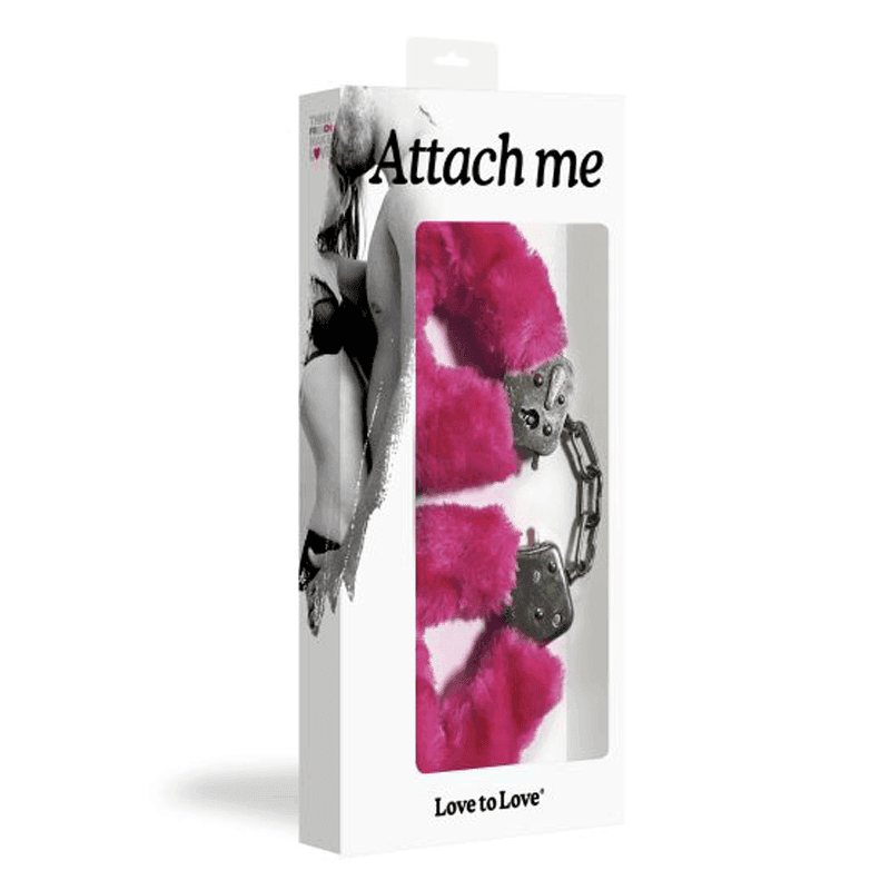 Product packaging with 'Attach me' text and a pink and black design.