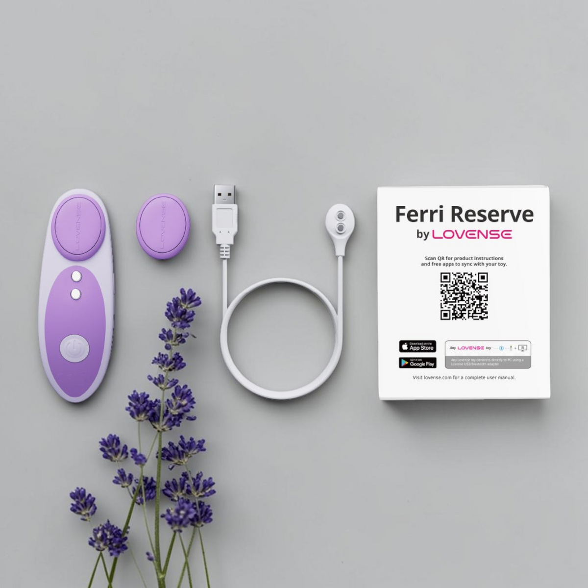 Vibrador clitoriano portátil Lovense Ferri Reserve en color lavanda con clip magnético, cable de carga y manual.
