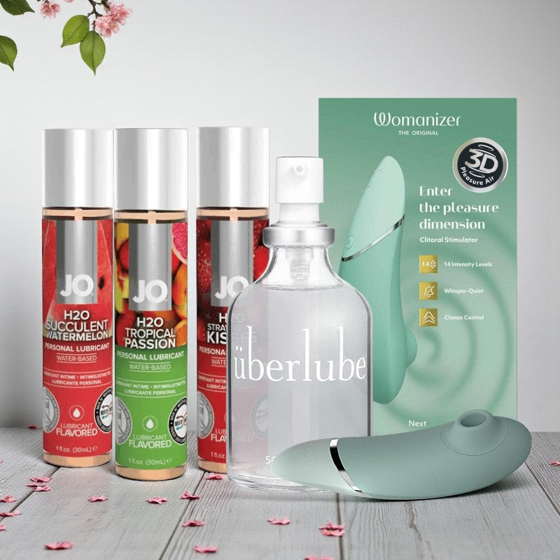 Collection of lubricant products including 'JO' and 'uberlube' with a 'Womanizer' PlayLoveToys